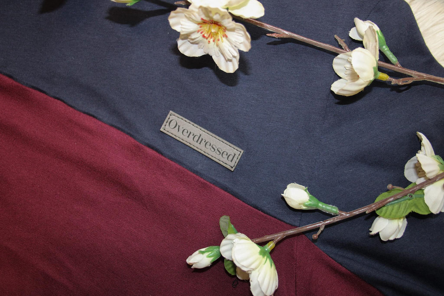 Label „overdressed"